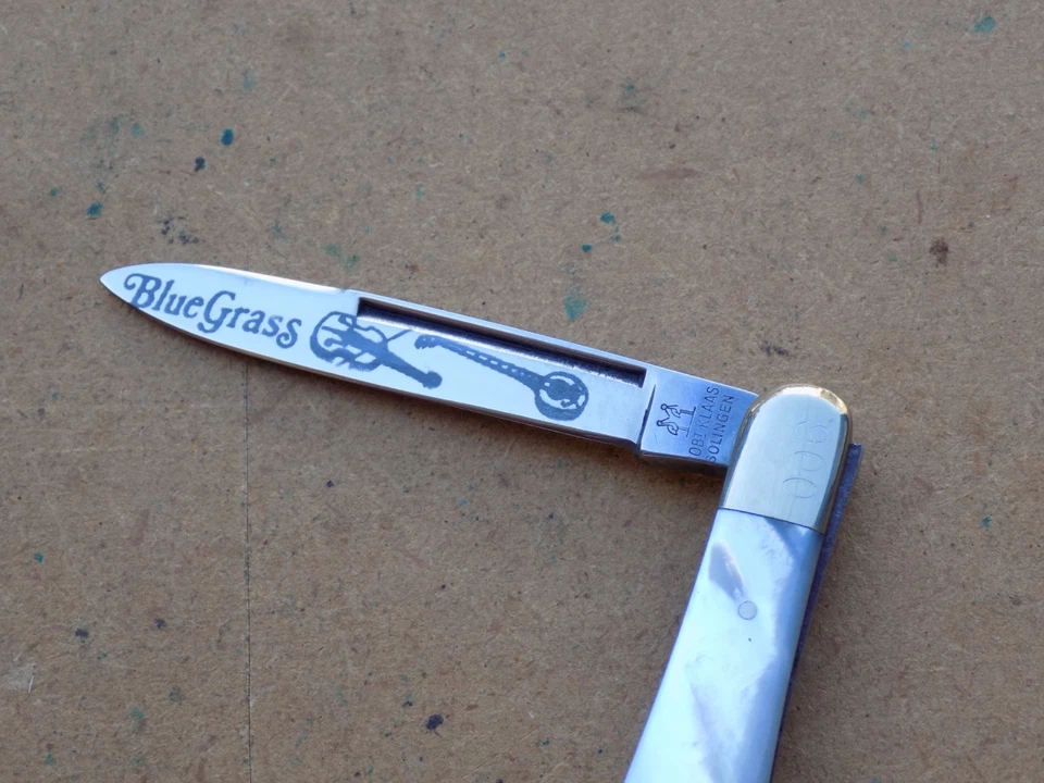 Navaja de Bolsillo Vintage Kissing Crane Solingen Alemania Azul Hierba Mango Perla Foto 3 de 4