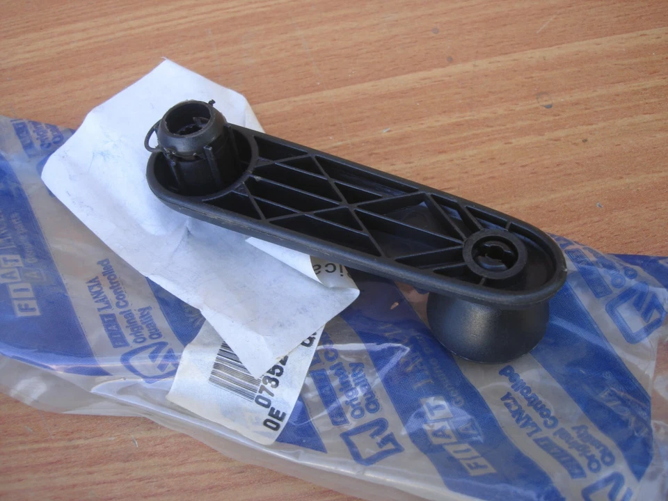 Manivela de ventana delantera para Fiat Punto 735269263 OEM Foto 2 de 3