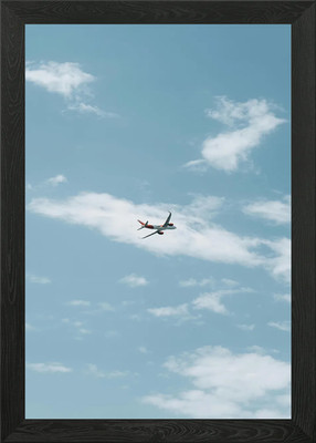 Flugzeug in einem bewölkten blauen Himmel gerahmtes Wandbild Poster Leinwanddruck Bild