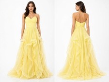 Elegant Gown With Fitted Bustier and Multi-Layered Skirt