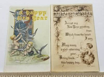 LOT OF TWO Antique 1908 HAPPY NEW YEARS POSTCARDS Embossed CUTE CHERUBS A4