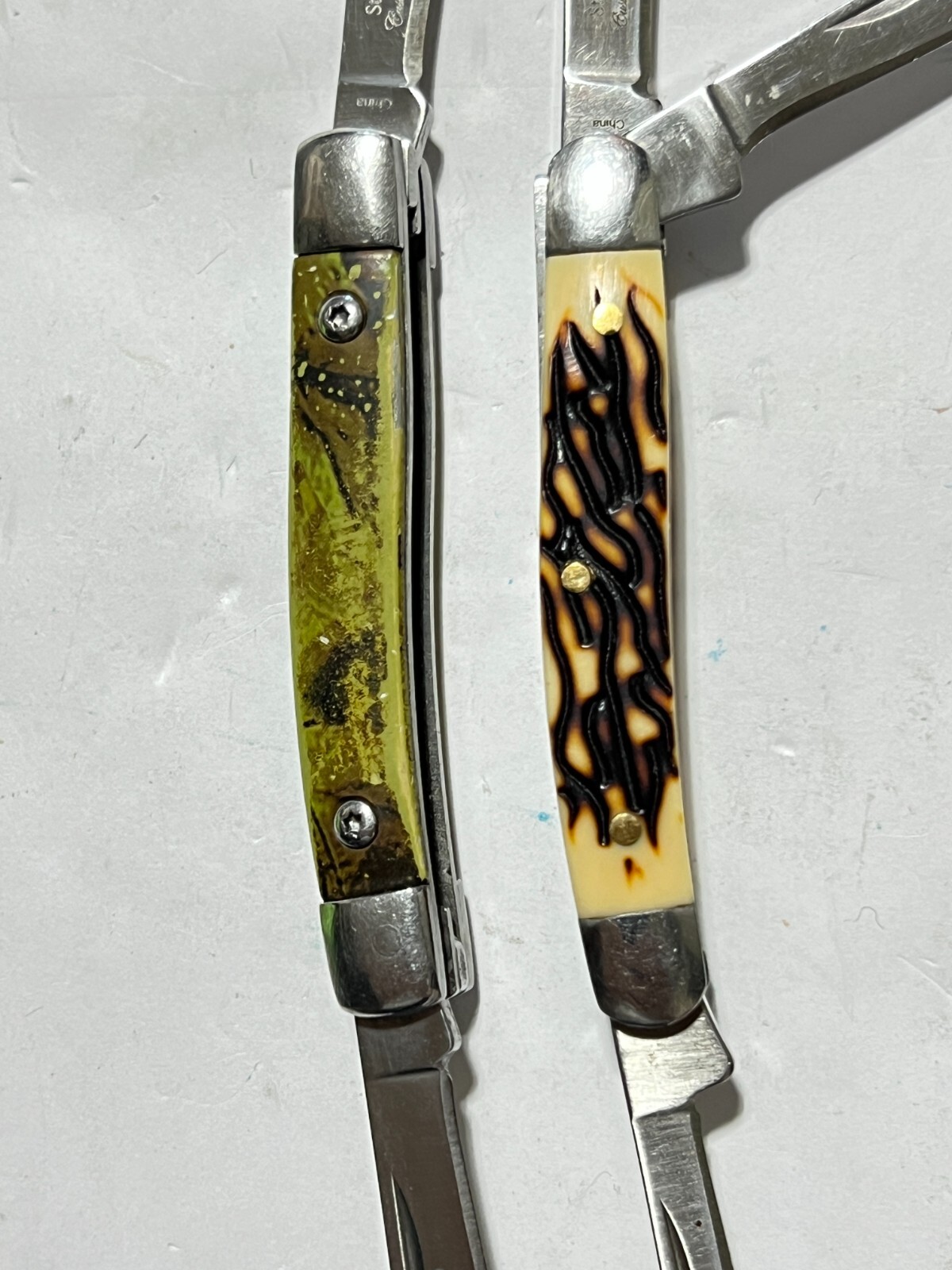 Lot of 4 Elk Ridge Pocket Knives .