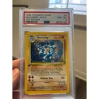 1999 Pokemon Base Set Machamp PSA 8