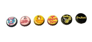 Vintage Soda Bottle Cap Collection Featuring Rare Soft Drink Brand Golden Bridge
