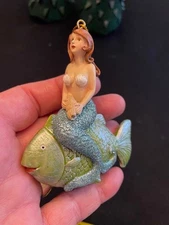 Sparkly Mermaid riding a fat Green fish! approx. 3X3.5" Whimsical