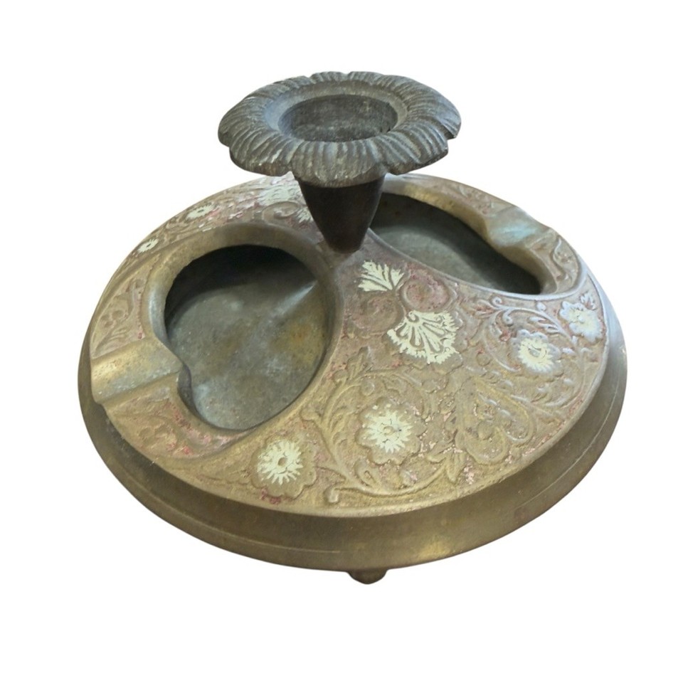 A double-well Victorian brass inkwell with a built-in pen rest — the kind of desk piece that makes a home office feel like a 19th-century study.