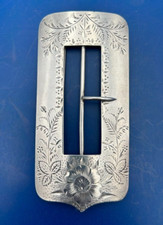 Vintage sterling silver belt buckle with bright cut flowers and foilage