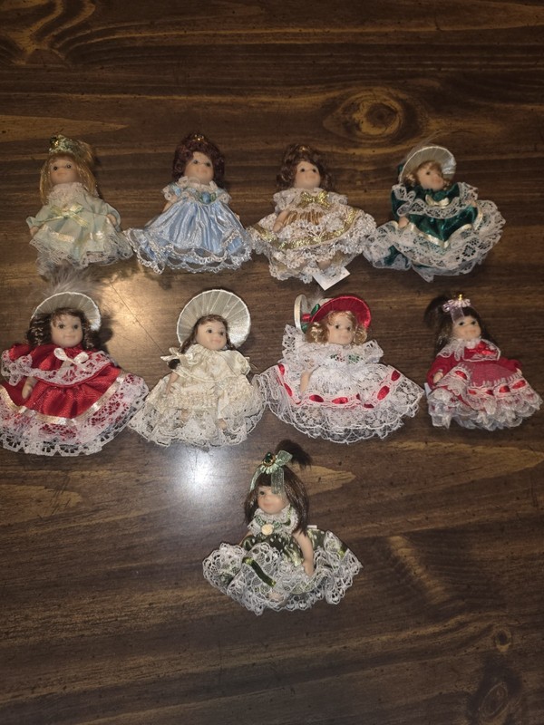 Set Of 9 Miniature Porcelain Dolls