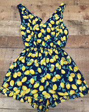 Francesca's Blue Rain Blue Lemon Print Ruffle Hem Romper w/Cutout Back Small EUC