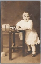 Little Girl w/ Doll, Toy Blocks RPPC Real Photo 1914 Postcard B704