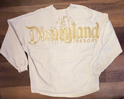 Disneyland Resort XL Pixie Dust Cream Spirit Jersey Gold Foil Raised Logo