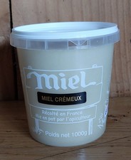 Miel du jura crémeux en pots d'un kilo, provenant de mes ruches.