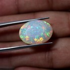 10.6 Carat Real AAAA Red Green Blue Multi Fire Ethiopian Opal Faceted Cabochon