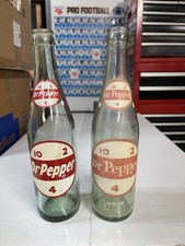Dr Pepper 12 Fl OZ  vintage pop bottles (lot of 2) 1 nice 1 ok