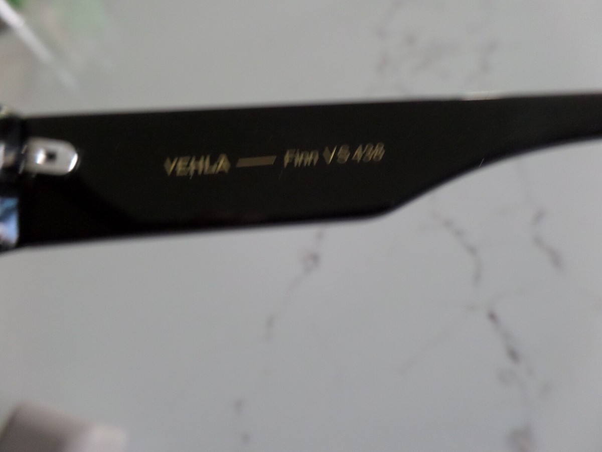 New Latest VEHLA Finn black paired with a khaki colored lens