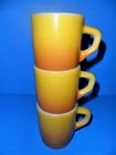 3 FIRE KING ANCHOR HOCKING MUGS Yellow Orange /Gold STACKING COFFEE MUGS Vintage