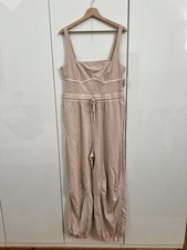 Free People Movement Inbound Einteiler Jumpsuit. Kaschmir - hellrosa/elfenbein. XL.