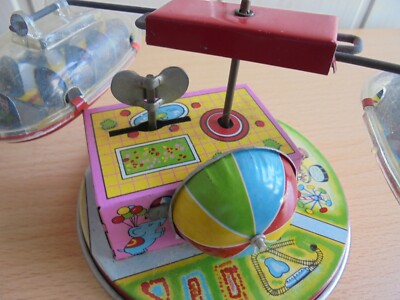 JOUET ANCIEN MECANIQUE AUTOMATE JAPAN MANEGE EN TOLE A CLEF QUI