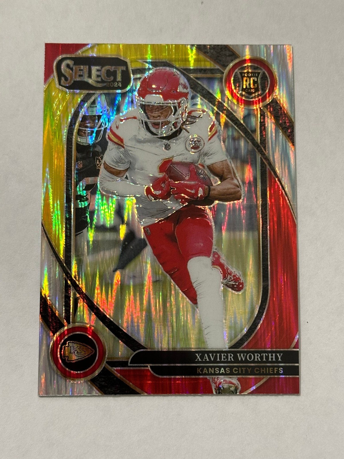 2024 Panini Select - Club Level Xavier Worthy #224 Red & Yellow Shock Prizm (RC)