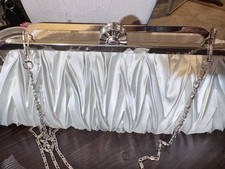 Vintage silver satin pleated poof evening bag with fancy closure and rhinestones