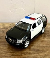 Welly 4.5 Diecast Police Chevrolet Tahoe Black And White Police Car Welly 4.5 Diecast Police Chevrolet Tahoe Black And White Police Car