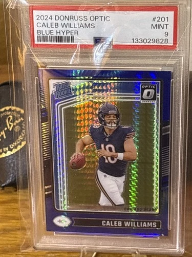 2024 Panini Donruss Optic Rated Rookie Caleb Williams 201 Blue Hyper Prizm PSA 9