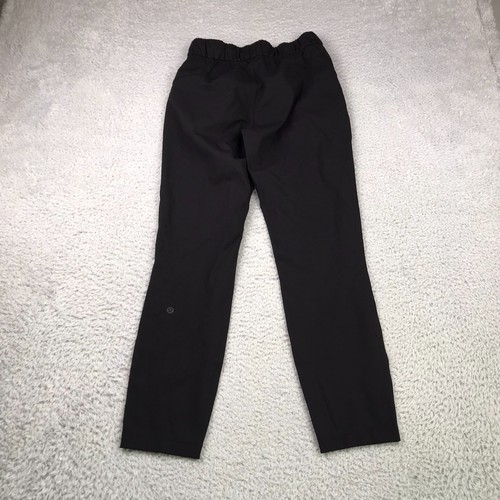 Pantalones Lululemon On The Fly 7/8 para mujer 2 (25x27) negro rendimiento cordón - Imagen 11 de 12