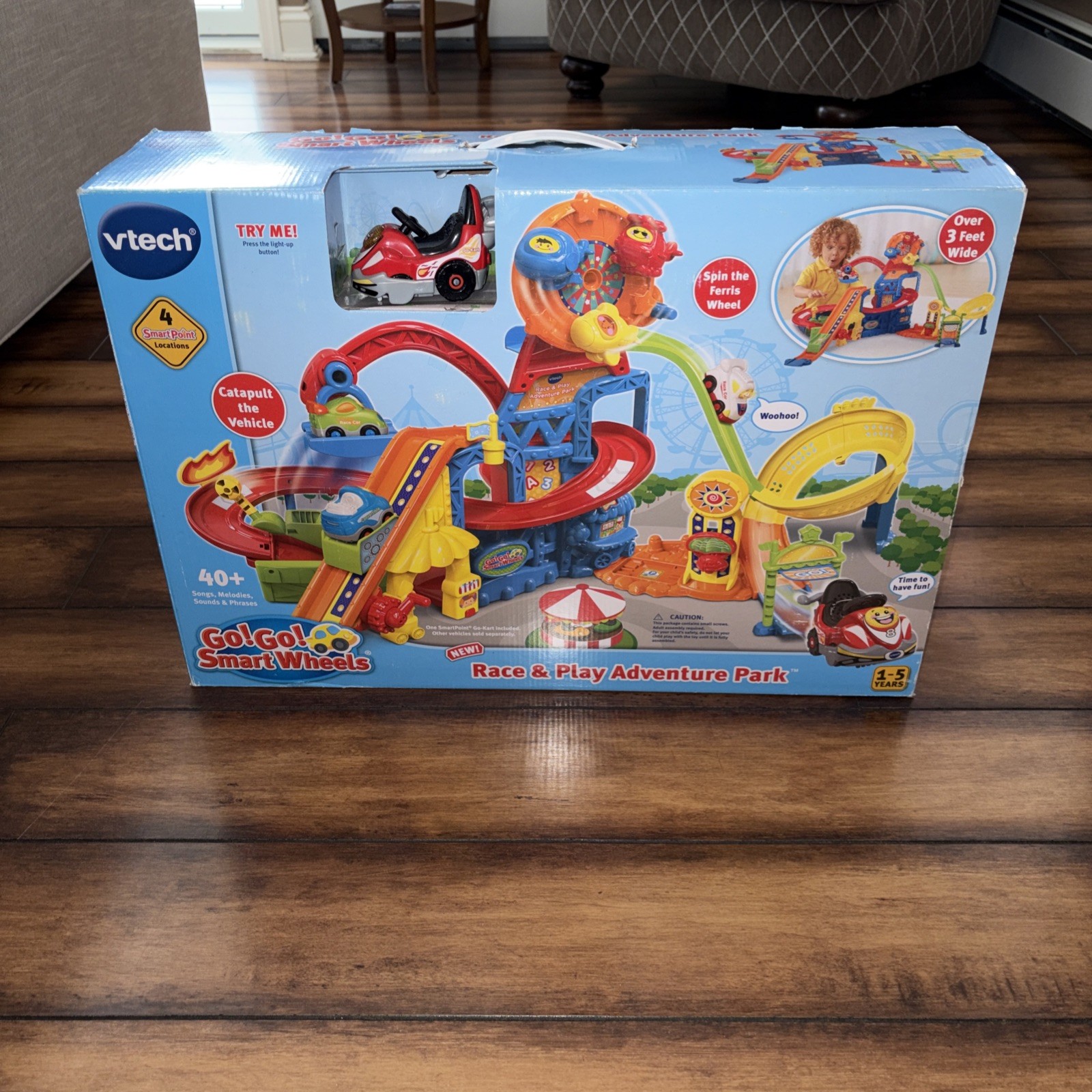 V-TECH GO! GO! SMART WHEELS RACE AND PLAY ADVENTURE PARK PLA