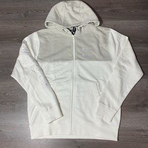 cream nike jacket
