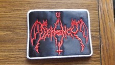 DEMONCY,SEW RED WITH WHITE BORDER EMBROIDERED PATCH