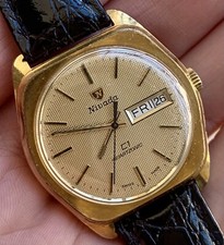 ✅ Reloj NIVADA - Caja y esfera dorada - Día/Fecha Cuarzo SUIZO ✅