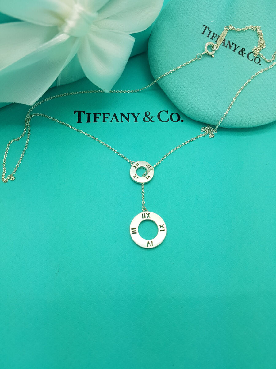 Tiffany & Co. Silver Atlas Pierced Circle Lariat Pendant 18 Tiffany & Co. Silver Atlas Pierced Circle Lariat Pendant 18