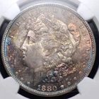 1880 S MORGAN DOLLAR NGC MS 65 REGAL TONE IN ELECTRIC BLUE AND RICH GOLDEN MAUVE