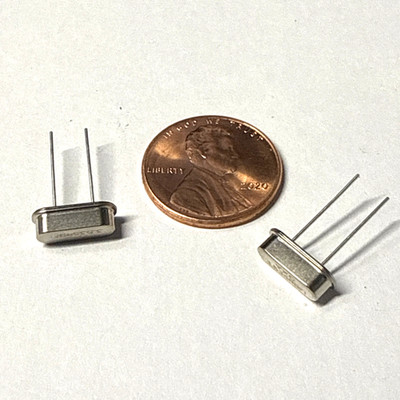 2 pcs 7.040 MHz Crystal. HC49/S