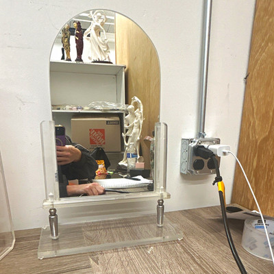 Vintage Art Deco lucite vanity mirror originating from 1920-1950