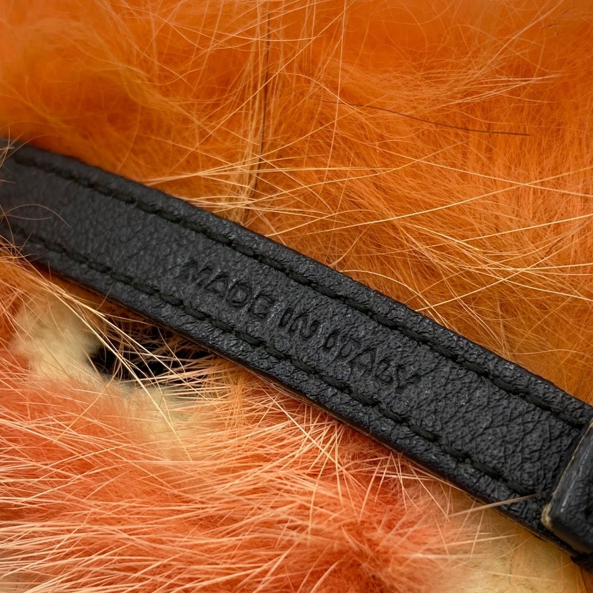 FENDI Monster fur charm keychain accessory in orange and salmon