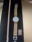 Seiko ladies vintage quartz watch, blue face, two tone metal band