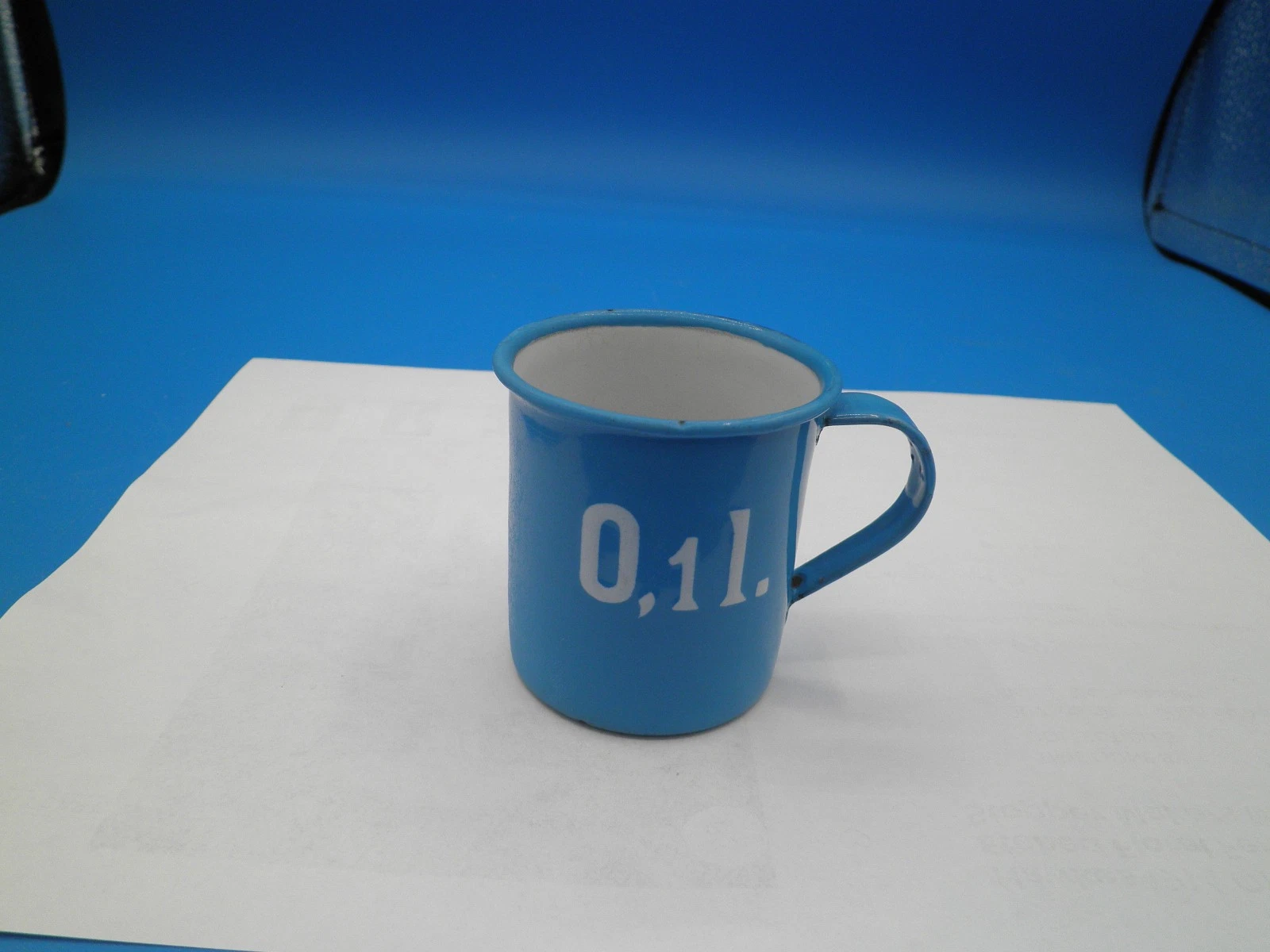 Small blue metric measuring cup Graniteware 2 1/2" tall 3" wide Robins egg blule