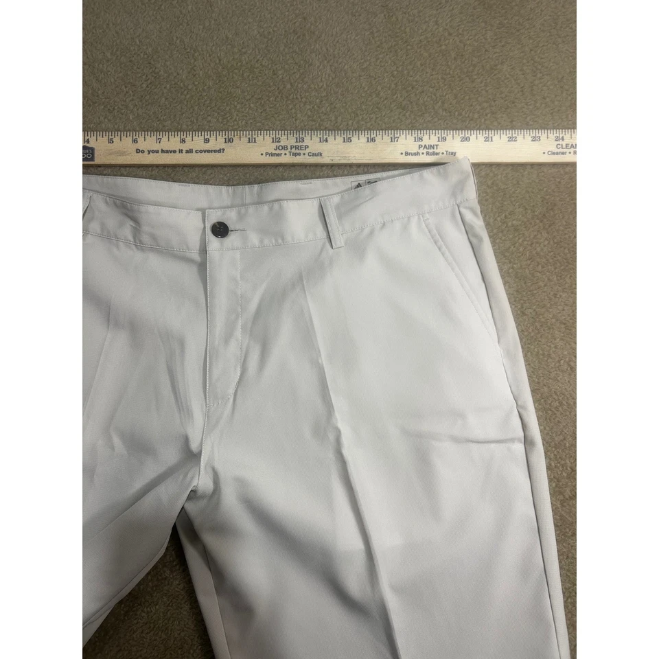 Pantalones Cortos de Golf Adidas Para Hombre 40 Beige Frente Plano Rendimiento Elástico Chino Foto 3 de 4