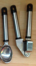 Stainless steel ice-cream scope and garlic press.