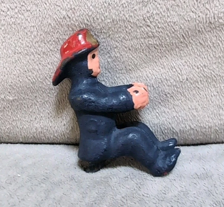 Cast Iron Fireman Toy for sale - eBay