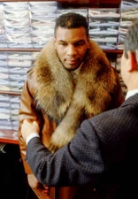 Mike Tyson gets fitted for a suit during a photo shoot in Atlantic- Old Photo