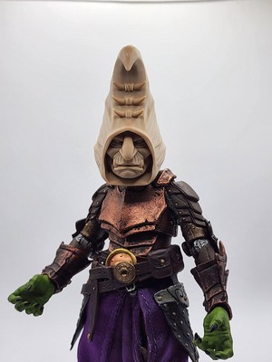 He's a wizard gary goblin head  - scaled for mythic legions 2.0 and 1/10 scale