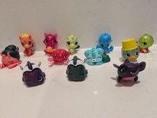 HATCHIMALS Collegtibles Animal FIGURES in Sparkle BLUE EGG CARTON CASE Set of 12