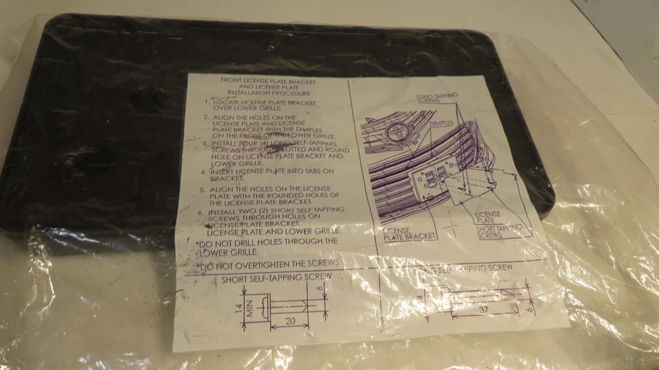 Soporte de matrícula delantero Toyota Avalon 2013-2018 OEM 7510107060 NUEVO stock antiguo Foto 3 de 4