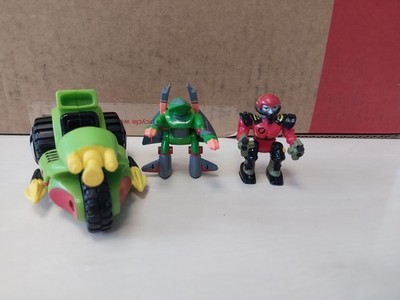 Micro Machines  Z- BOTS 1992 2 Figuren und Road Raider Fahrzeug