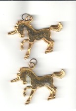 1 pair of gold colored Unicorn Pendants for use with charm bracelet