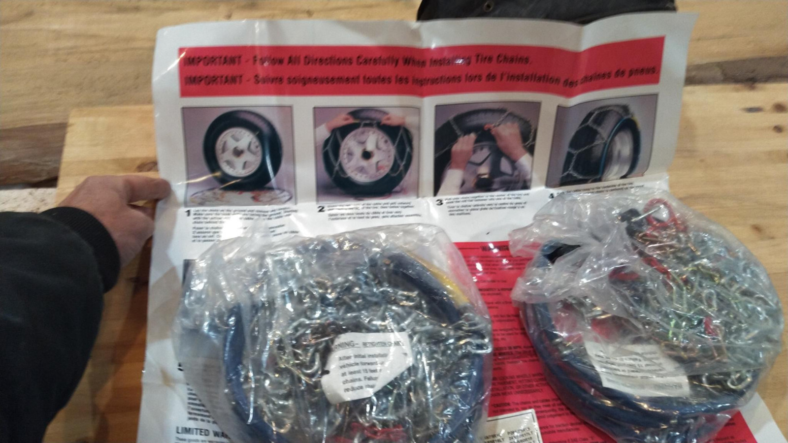 Brand New diamond pattern tire chains, Les schwab, never used, fits