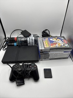 Sony Playstation 2 PS2 Konsole + SingStar Bundle (2x Mikros) + Spiele + Buzz