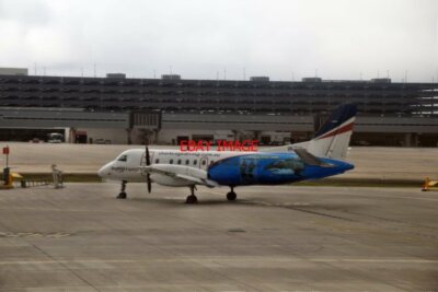 FOTO REX SAAB 340B VH-EKX MIT HAIKÄFIG TAUCHEN WERBE VINYLS BEI MELBOURN